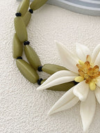 Çekici Çiçek Desenli Boncuklu Bilezik Zarif Detaylarla