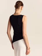 Asimetrik Etek Ucu Kayık Yaka Kolsuz Triko Üst